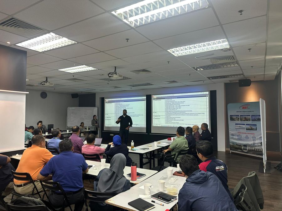 Jayden running a workshop for MRT Corp staff